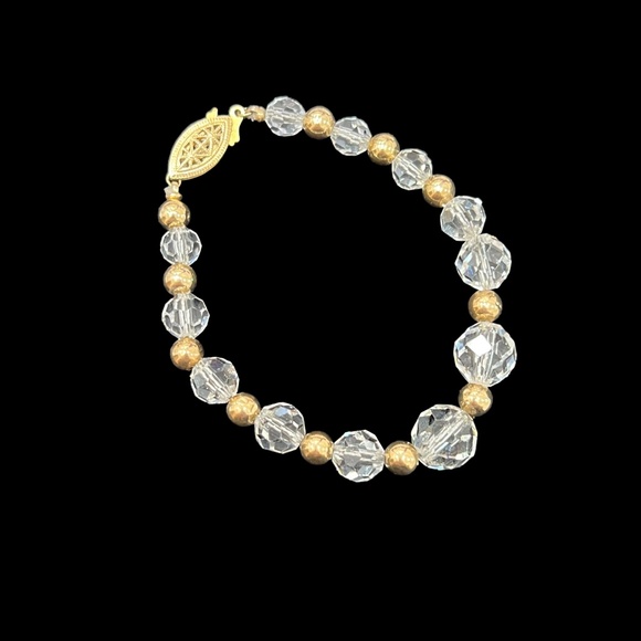 VINTAGE FACETED CLEAR CRYSTAL AND SMOOTH GOLD TONE BEAD BRACELET - Picture 1 of 15